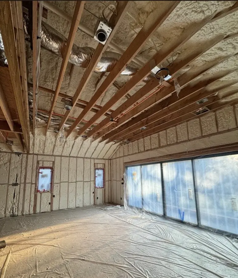 Interior walls and ceiling insulated with spray foam during new construction in The Hammocks